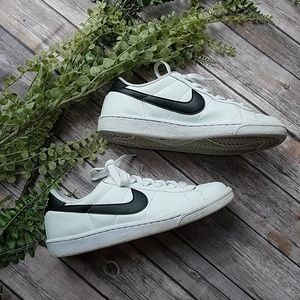 white nike with black check